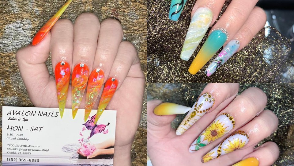 Manicured nails displayed in a salon setting.